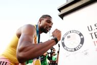 Noah Lyles signs a miniature Eiffel Tower after winning the men's 200 meter final at the 2024 U.S. Olympic Team Track & Field Trials at Hayward Field on June 29, 2024, in Eugene, Oregon. (Photo by Getty Images)